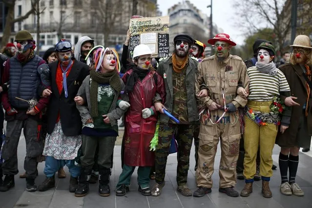 Environmentalists gather during a protest near the Place de la Republique after the cancellation of a planned climate march following shootings in the French capital, ahead of the World Climate Change Conference 2015 (COP21), in Paris, France, November 29, 2015. (Photo by Benoit Tessier/Reuters)