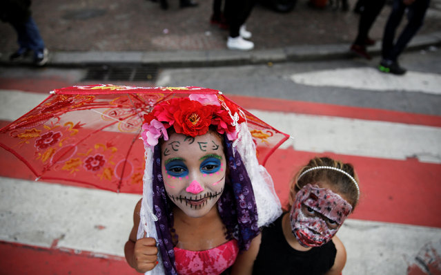 Girls participate in a Zombie Walk in Sao Paulo, Brazil, November 2, 2016. (Photo by Nacho Doce/Reuters)