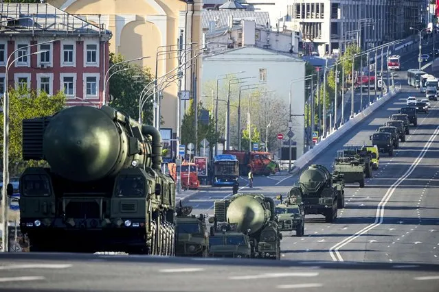 Russian RS-24 Yars ballistic missiles roll toward Red Square to attend a dress rehearsal for the Victory Day military parade in Moscow, Russia, Sunday, May 7, 2023. (Photo by AP Photo/Stringer)