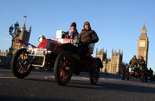 Participants drive their vintage car over Westminster bridge during the annual London to Brighton veteran car run in London, Britain November 6, 2016. (Photo by Neil Hall/Reuters)
