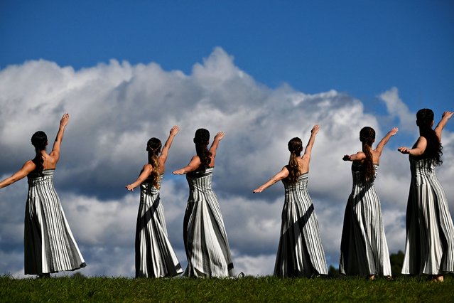 Actresses perform during a rehearsal of the lighting of the Olympic flame for the Milano-Cortina 2026 Winter Olympic Games, in the ancient Temple of Hera at the archaeological site of Olympia, birthplace of the ancient Olympics in southern Greece, on November 24, 2025. (Photo by Aris Messinis/AFP Photo)
