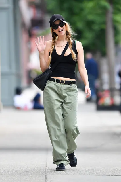 Jennifer Lawrence looks in high spirits while out in New York City on June 3, 2023. The 32 year old American actress flashed a wave and a smile as she headed out wearing a black tank top paired with green khaki trousers and black Adidas trainers. (Photo by The Image Direct)