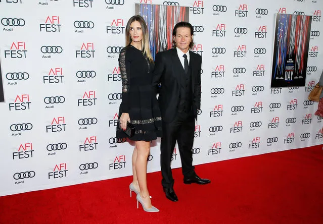 Actor Mark Wahlberg (R) and his wife Rhea Durham (L) pose at AFI Fest's special closing night gala presentation of the film “Patriots Day” in Los Angeles, California, U.S., November 17, 2016. (Photo by Danny Moloshok/Reuters)