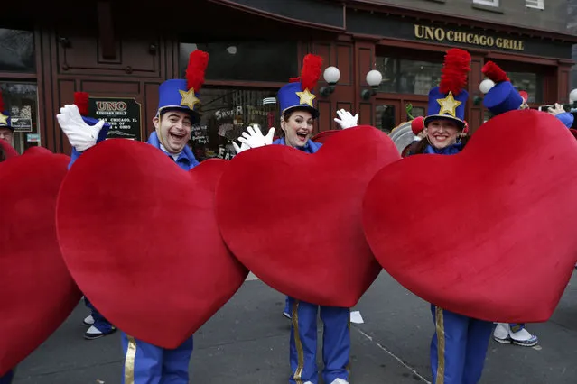 People in Customs pose as they arrive to take part during the 90th annual Macy's Thanksgiving Day Parade on November 24, 2016 in New York. (Photo by Kena Betancur/AFP Photo)
