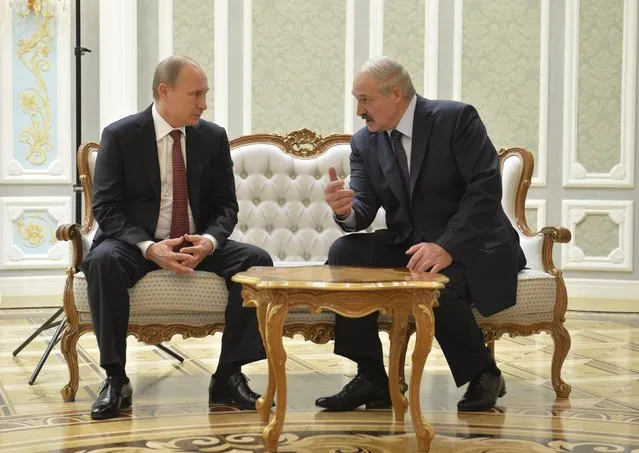 Belarus' President Alexander Lukashenko (R) meets with his Russian counterpart Vladimir Putin during peace talks in Minsk, February 11, 2015. (Photo by Alexei Druzhinin/Reuters/RIA Novosti/Kremlin)