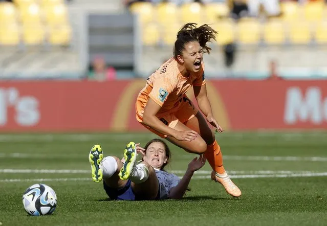 Lieke Martens of Netherlands is tackled by Andi Sullivan of USA during the FIFA Women's World Cup Australia & New Zealand 2023 Group E match between USA and Netherlands at Wellington Regional Stadium on July 27, 2023 in Wellington / Te Whanganui-a-Tara, New Zealand. (Photo by Amanda Perobelli/Reuters)