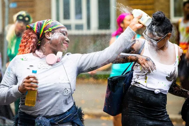 Revellers take part in the Notting Hill Carnival in London, Britain on August 26, 2018. (Photo by South West News Service)