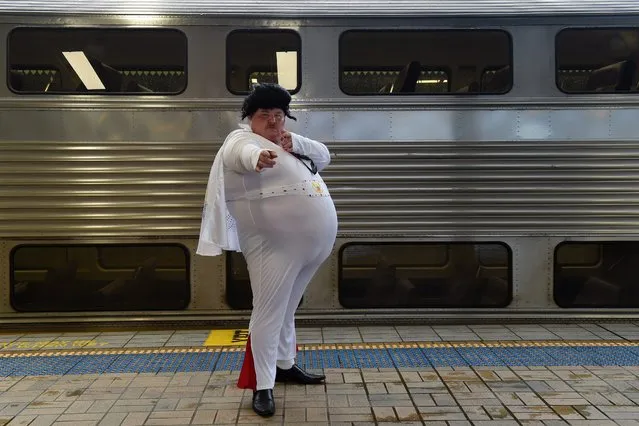 Elvis fan and impersonator Sean Wright of Bowral poses for a photograph before boarding the Elvis Express at Central Station in Sydney, Australia, 07 January 2016. The Elvis Express is bound for the Parkes Elvis Festival in the regional town of Parkes. (Photo by Dean Lewins/EPA)