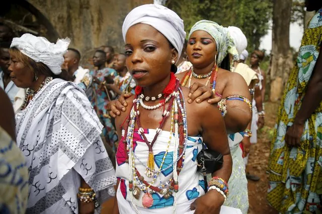 Devotees attend the annual voodoo festival in Ouidah January 10, 2016. (Photo by Akintunde Akinleye/Reuters)