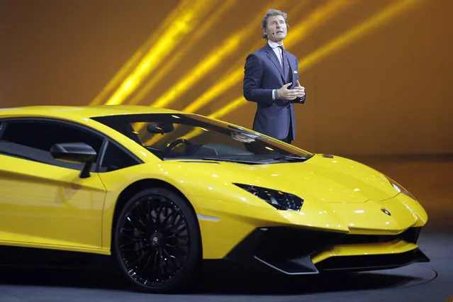 The President and CEO of Lamborghini Stephan Winkelmann introduces the new Lamborghini Aventador SV during a preview show of Volkswagen Group, as part of the 85th Geneva International Motor Show, Switzerland, Monday, March 2, 2015. (AP Photo/Laurent Cipriani)