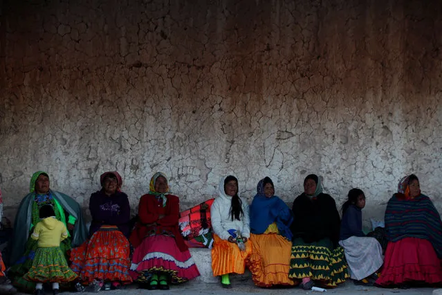 Women from the Tarahumara ethnic group sit while preparing for winter in Caborachi village, in Guachochi, Mexico, December 17, 2016. (Photo by Jose Luis Gonzalez/Reuters)