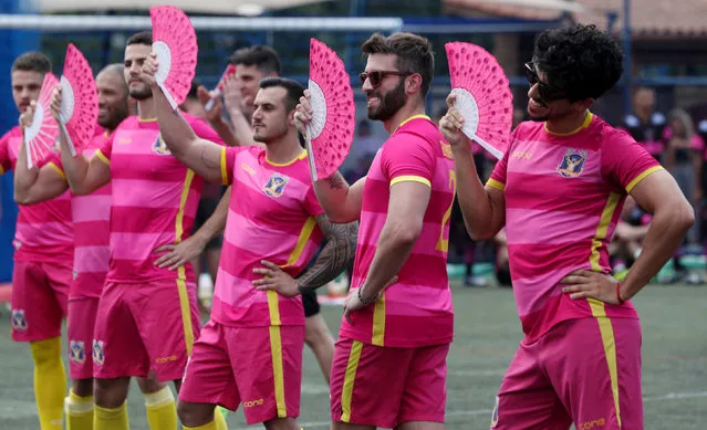 Soccer players of the Futeboys soccer team attend the opening ceremony of the Champions LiGay, a gay soccer tournament in Sao Paulo, Brazil November 2, 2018. (Photo by Paulo Whitaker/Reuters)