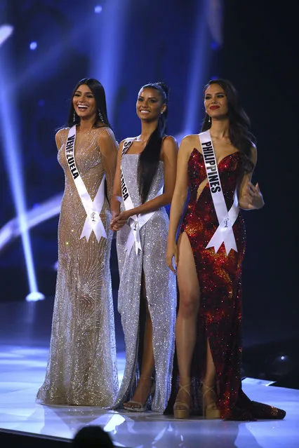 Top 3 finalists from left to right, Miss Venezuela Sthefany Gutierrez, Miss South Africa Tamaryn Green, Miss Philippines Catriona Gray, stand on the stage during the final of 67th Miss Universe competition in Bangkok, Thailand, Monday, December 17, 2018. (Photo by Gemunu Amarasinghe/AP Photo)