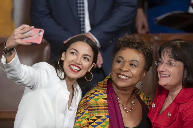 Rep.-elect Alexandria Ocasio-Cortez, a freshman Democrat representing New York's 14th Congressional District, takes a selfie with Rep. Ann McLane Kuster, D-NH, and Rep. Barbara Lee, D-Calif., on the first day of the 116th Congress with Democrats holding the majority, at the Capitol in Washington, Thursday,  January 3, 2019. (Photo by J. Scott Applewhite/AP Photo)