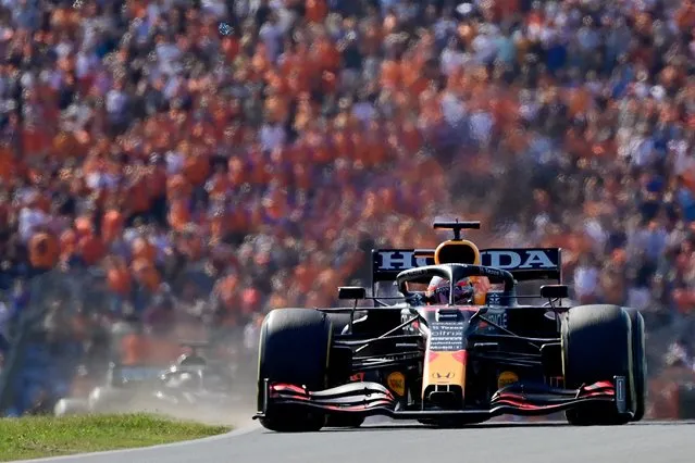 Red Bull's Dutch driver Max Verstappen races at the Zandvoort circuit during the Netherlands' Formula One Grand Prix in Zandvoort on September 5, 2021. (Photo by ANdrej Isakovic/AFP Photo)