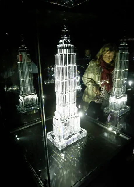 Visitors look at an exhibit at the Swarowski Crystal World museum on its reopening day following renovation, in the western Austrian village of Wattens April 30, 2015. (Photo by Dominic Ebenbichler/Reuters)