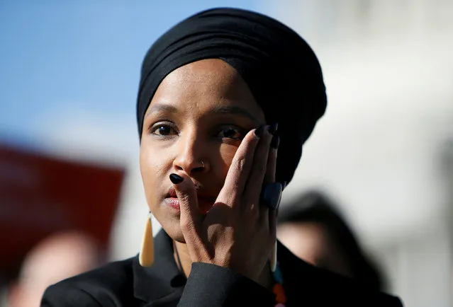 Rep. Ilhan Omar (D-MN) wipes tears from her eye as she speaks about Trump administration policies towards Muslim immigrants at a news conference by members of the U.S. Congress “to announce legislation to repeal President Trump’s existing executive order blocking travel from majority Muslim countries” outside the U.S. Capitol in Washington, U.S., April 10, 2019. (Photo by Jim Bourg/Reuters)