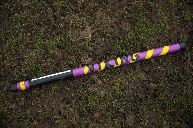 Quidditch player Eva Verpe's broom is pictured laying on the grass before the Crumpet Cup quidditch tournament on Clapham Common on February 18, 2017 in London, England. (Photo by Jack Taylor/Getty Images)