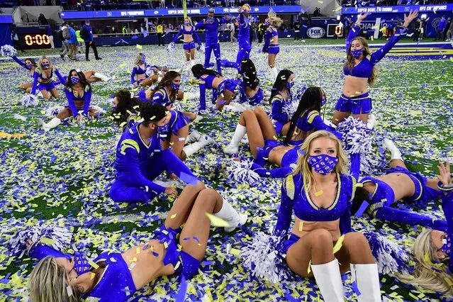 Los Angeles Rams cheerleaders celebrate on the field with the confetti after the Rams 20-17 victory over the San Francisco 49ers in a NFC championship football game at SoFi Stadium in Inglewood on Sunday, January 30, 2022. (Photo by  Gary A. Vasquez/USA TODAY Sports)