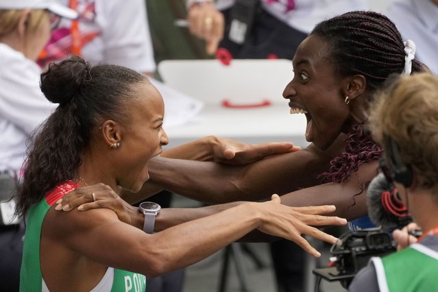 Fatoumata Binta Diallo, of Portugal, left, and Ayomide Folorunso, of Italy, react to the announcement of the official results after competing in a women's 400 meters hurdles semifinal at the European Athletics Championships in Rome, Monday, June 10, 2024. The two qualified for the final. (Photo by Gregorio Borgia/AP Photo)
