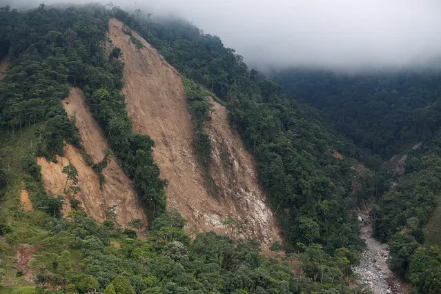 Aerial view of the mountain where the landslide originated after flooding and mudslides caused by heavy rains leading several rivers to overflow, pushing sediment and rocks into buildings and roads, in Mocoa, Colombia April 3, 2017. (Photo by Jaime Saldarriaga/Reuters)