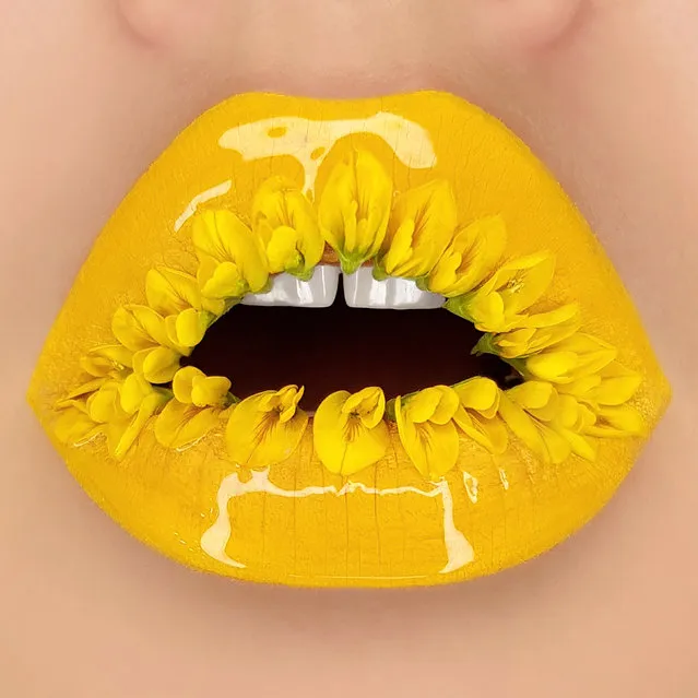 Tutushka's lipstick art work on her lips showing a sunflower. (Photo by Tutushka Matviienko/Caters News Agency)