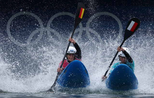 Ricarda Funk of Germany and Klaudia Zwolinska of Poland in action during women's kayak cross round 1 on August 3, 2024. (Photo by Yara Nardi/Reuters)