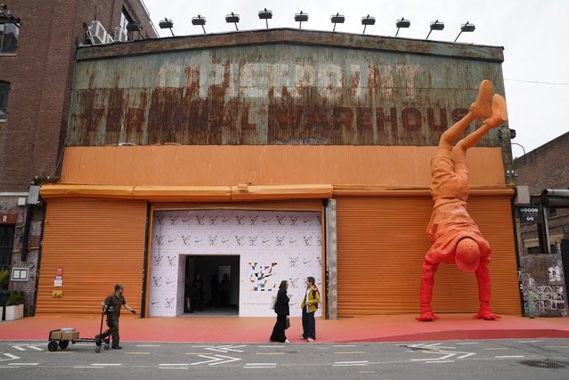 A sculpture of the late Virgil Abloh, the founder of Off-White and the Men's Artistic Director of Louis Vuitton, during a immersive exhibition showcasing 47 limited editions of the Nike “Air Force 1” sneaker created by Virgil Abloh in partnership with Nike for Louis Vuitton May 20, 2022 at the Greenpoint Terminal Warehouse in Brooklyn, New York. Some of Virgil Abloh's final creations will be on public display in New York in an expo that also confers further mystique to the lucrative world of specialty sneakers.Opening Saturday and running through the end of May, the show will present 47 customized Nike “Air Force 1” sneakers designed by Abloh and assembled at Louis Vuitton's manufacturing facility in Venice. (Photo by Timothy A. Clary/AFP Photo)