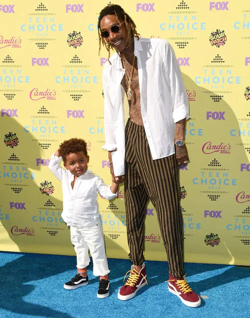 Sebastian Taylor Thomaz (L) and rapper Wiz Khalifa attends the Teen Choice Awards 2015 at the USC Galen Center on August 16, 2015 in Los Angeles, California. (Photo by Jason Merritt/Getty Images)