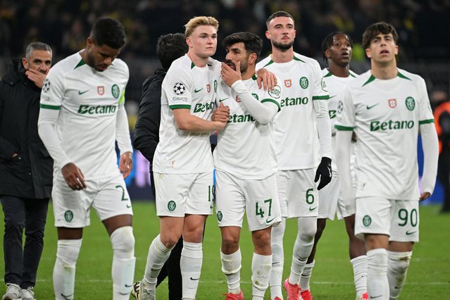 Sporting players react after the UEFA Champions League second-leg knockout round play-off football match BVB Borussia Dortmund vs Sporting CP at the Signal Iduna stadium in Dortmund, western Germany, on February 19, 2025. (Photo by Uwe Kraft/AFP Photo)