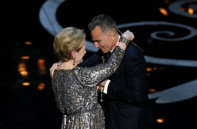 Daniel Day-Lewis and Meryl Streep embrace after Streep presented Day-Lewis with the award for best actor in a leading role for his performance in “Lincoln”. Day-Lewis became the first male actor to win three leading role Oscars. (Photo by Robert Gauthier/Los Angeles Times/MCT)