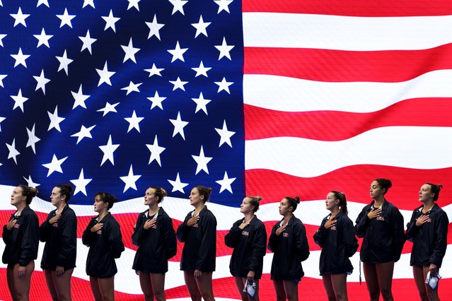 Team United States stands for the national anthem prior to the Women's Water Polo Group B match against Team China on day one of the Singapore 2025 World Aquatics Championships at OCBC Aquatic Centre on July 11, 2025 in Singapore. (Photo by Yong Teck Lim/Getty Images)
