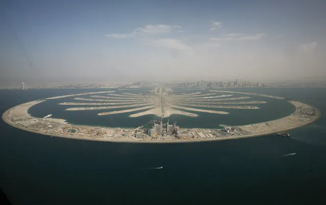 An aerial view of the man-made palm tree-shaped islands in Dubai, September 7, 2007. (Photo by Ahmed Jadallah/Reuters)