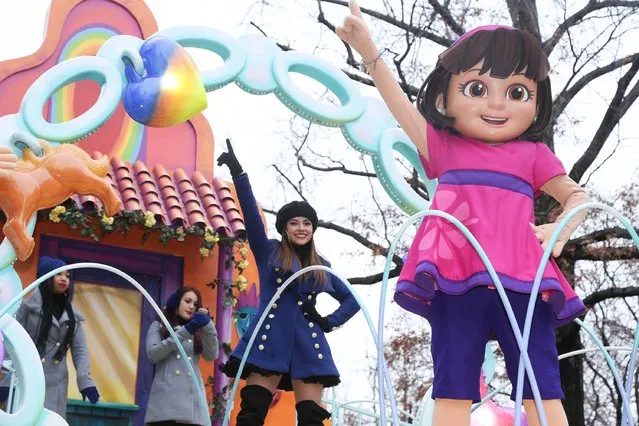 Becky G (C) performs on the Nickelodeon's Dora and Friends: Into The City float which makes its debut at the 88th Annual Macy's Thanksgiving Day Parade on November 27, 2014 in New York City. (Photo by Rob Kim/Getty Images for Nickelodeon)