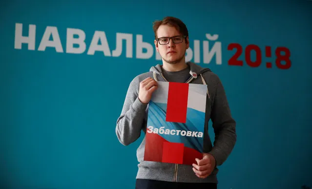 Grigory Kulikovskikh, 26, IT specialist and supporter of Russian opposition leader Alexei Navalny, poses for a picture in Moscow, Russia, February 10, 2018. Kulikovskikh is calling for a boycott of the upcoming presidential election. “This is not a country of the future, it’s a country stuck in the past. I can't visualise the future right now”, said Kulikovskikh. “Most people don't care. The absolute majority, they just don't think about things. They're asleep. They don't care whether it's Putin or Navalny – they need to be woken up. Then change will really happen”. (Photo by Maxim Shemetov/Reuters)