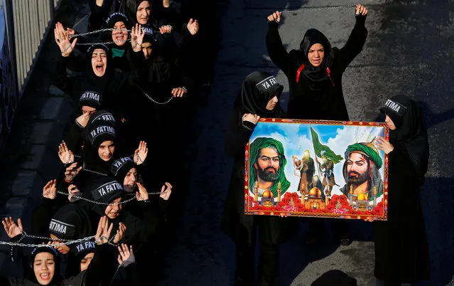 Shi'ite Muslim women shout Islamic slogans as they mourn during an Ashura procession in Istanbul, Turkey, October 11, 2016. (Photo by Murad Sezer/Reuters)