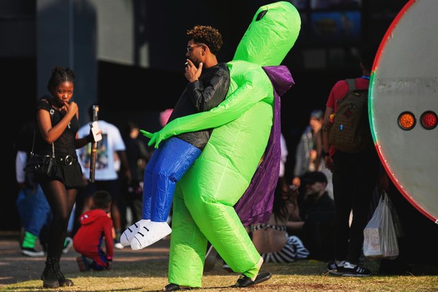 A man dressed up takes a smoke break during the Comic Con Festival in Johannesburg, South Africa, Saturday, August 30, 2025. (Photo by Themba Hadebe/AP Photo)