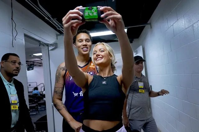 Phoenix Mercury guard Sophie Cunningham takes a selfie with teammate Brittney Griner, during the WNBA basketball teams' media day, in Phoenix, Wednesday, May 3, 2023. (Photo by Matt York/AP Photo)