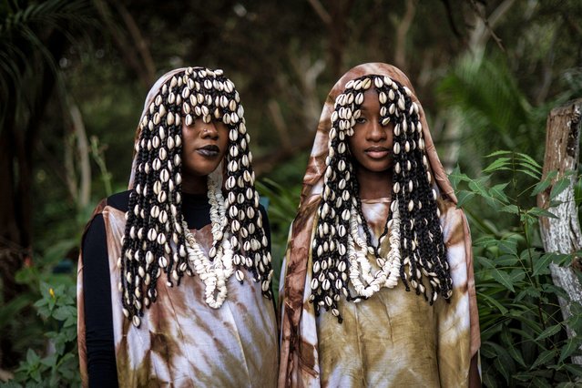 Models pose for a portrait ahead of the final show of Dakar Fashion Week at Parc Hann, Dakar, December 7, 2024. (Photo by John Wessels/AFP Photo)