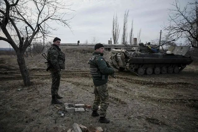 Ukrainian servicemen are pictured at their positions near Debaltseve, eastern Ukraine, February 8, 2015. (Photo by Gleb Garanich/Reuters)