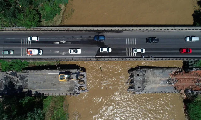 Drone photo shows the Cevizdere transportation bridge after it collapsed following the flash floods hit Unye district of Ordu, Turkey on August 10, 2018. (Photo by Hakan Burak Altunoz/Anadolu Agency/Getty Images)