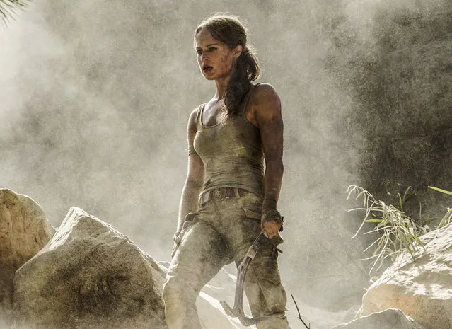 This image released by Warner Bros. Pictures shows Alicia Vikander in a scene from “Tomb Raider”. It took weeks of training and plates full of protein to turn former ballerina Alicia Vikander into action star Lara Croft. (Photo by Ilze Kitshoff/Warner Bros. Pictures via AP Photo)