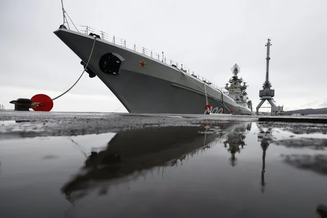 The Northern Fleet's flagship, the Pyotr Veilikiy (Peter the Great) missile cruiser, is seen at its Arctic base of Severomorsk, Russia, Thursday, May 13, 2021. Adm. Alexander Moiseyev, the commander of Russia's Northern Fleet griped Thursday about increased NATO's military activities near the country's borders, describing them as a threat to regional security. (Photo by Alexander Zemlianichenko/AP Photo)