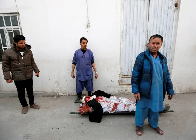 An injured person lies at a hospital after a suicide attack in Kabul, Afghanistan January 10, 2017. (Photo by Mohammad Ismail/Reuters)
