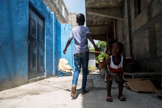 Children are seen at a shelter for families displaced by gang violence at the Saint Yves Church in Port-au-Prince, Haiti on July 26, 2021. (Photo by Ricardo Arduengo/Reuters)