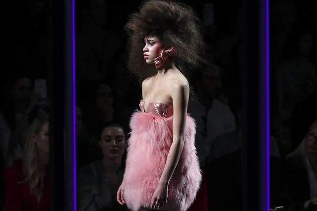 A model displays a creation by Portuguese designer David Ferreira on the second day of the Lisbon Fashion Week, at the Carlos Lopes Pavillion in Lisbon, Portugal, 09 March 2019. (Photo by Miguel A. Lopes/EPA/EFE)