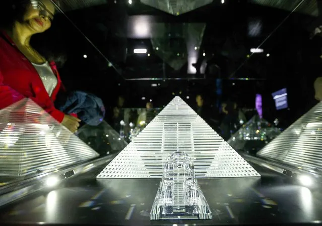 Visitors look at an exhibit at the Swarowski Crystal World museum on its reopening day following renovation, in the western Austrian village of Wattens April 30, 2015. (Photo by Dominic Ebenbichler/Reuters)