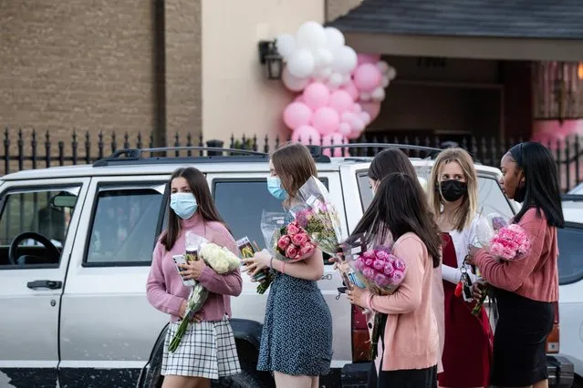 Mourners gather at the visitation for Brianna Rodriguez, a concertgoer who died in a stampede during a Travis Scott performance at the 2021 Astroworld Festival, in Houston, Texas, U.S., November 12, 2021. (Photo by Pu Ying Huang/Reuters)