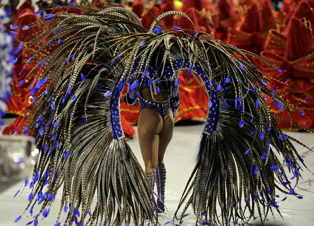 A reveller parades for the Tom Maior samba school during the carnival in Sao Paulo, Brazil, February 24, 2017. (Photo by Paulo Whitaker/Reuters)