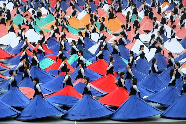 Actors perform during the opening ceremony of the 2015 European Games in Baku, Azerbaijan, Friday, June 12, 2015. (AP Photo/Dmitry Lovetsky)